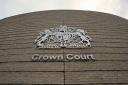 A 54-year-old voyeur from Peterborough was given a 21-week prison sentence at Cambridge Crown Court (pictured) after hiding a camera in a family bathroom