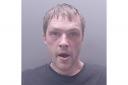 Thomas Smiley has been jailed after he repeatedly rammed a police car in a desperate bid to get away