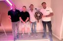 Golf day winners – Steve Manning and team from sub-contractors JSJ Roofing – with their trophy.