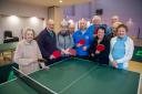 The table tennis club will use the money to buy new equipment.