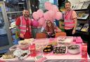 Some of the employees at Amazon in Peterborough who wore pink t-shirts and dyed their hair pink to mark Breast Cancer Awareness Month