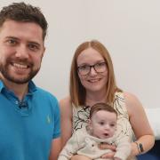 Cancer was ruled out for Baby Oliver following whole genome sequencing at Addenbrooke\'s Hospital. His pictured with his parents Sara and Michael Bell.