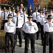Cambridgeshire\'s 18 new police officers are pictured at their passing out ceremony.
