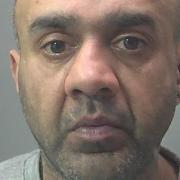 Aitzaz Sadiq has been jailed for more than nine years for stabbing his neighbour.