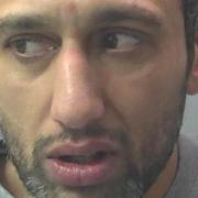 Naweed Khaliq, of Towler Street, Peterborough, has been jailed after he threatened staff at Genevas Bar with a brick and then assaulted a police officer.