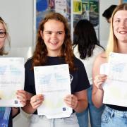 Mia, Lily-Beth, Kayden with their GCSE results.