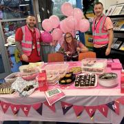 Some of the employees at Amazon in Peterborough who wore pink t-shirts and dyed their hair pink to mark Breast Cancer Awareness Month