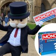 Mr Monopoly outside Peterborough Cathedral when it was announced the city will be getting its own