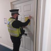 Flat 2 being closed by Cambridgeshire Police.