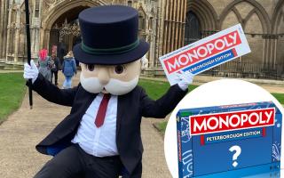 Mr Monopoly outside Peterborough Cathedral when it was announced the city will be getting its own